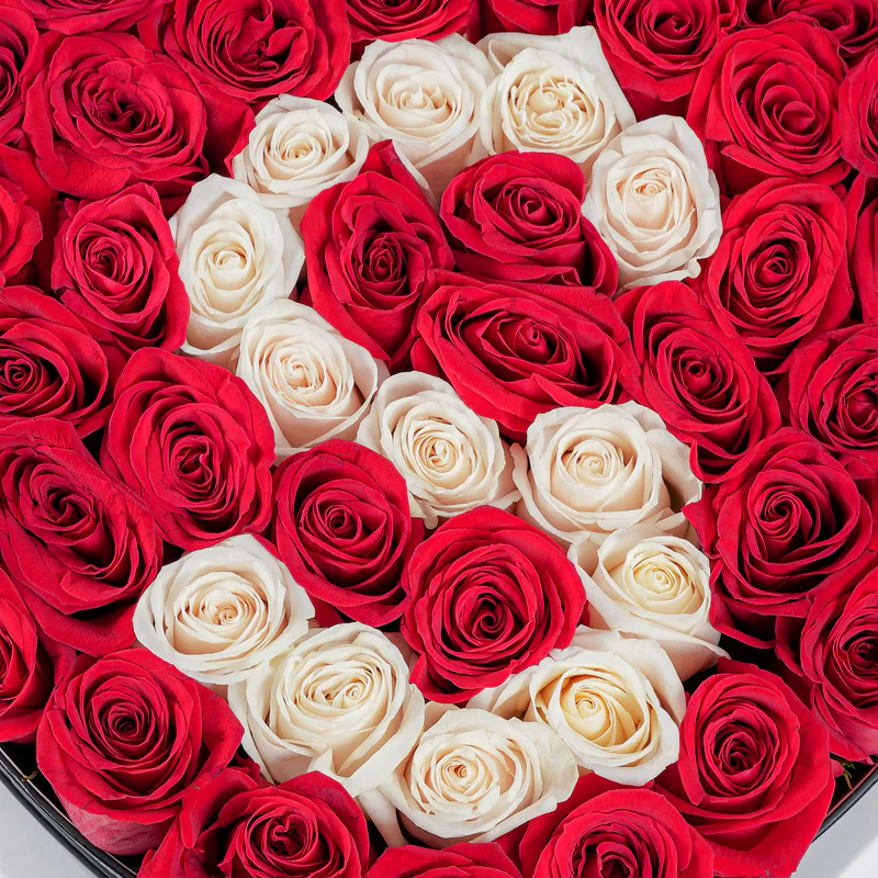 Heart shaped rose arrangement featuring red and white roses from Bloom Marbella