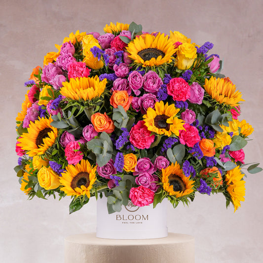 Bloom Marbella luxury flower hatbox Marbella with bright sunflowers and vibrant mixed roses