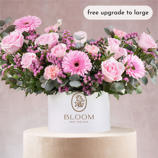 Pink Perfection Hatbox gift Marbella Bloom with pink roses and gerbera flowers in white round box